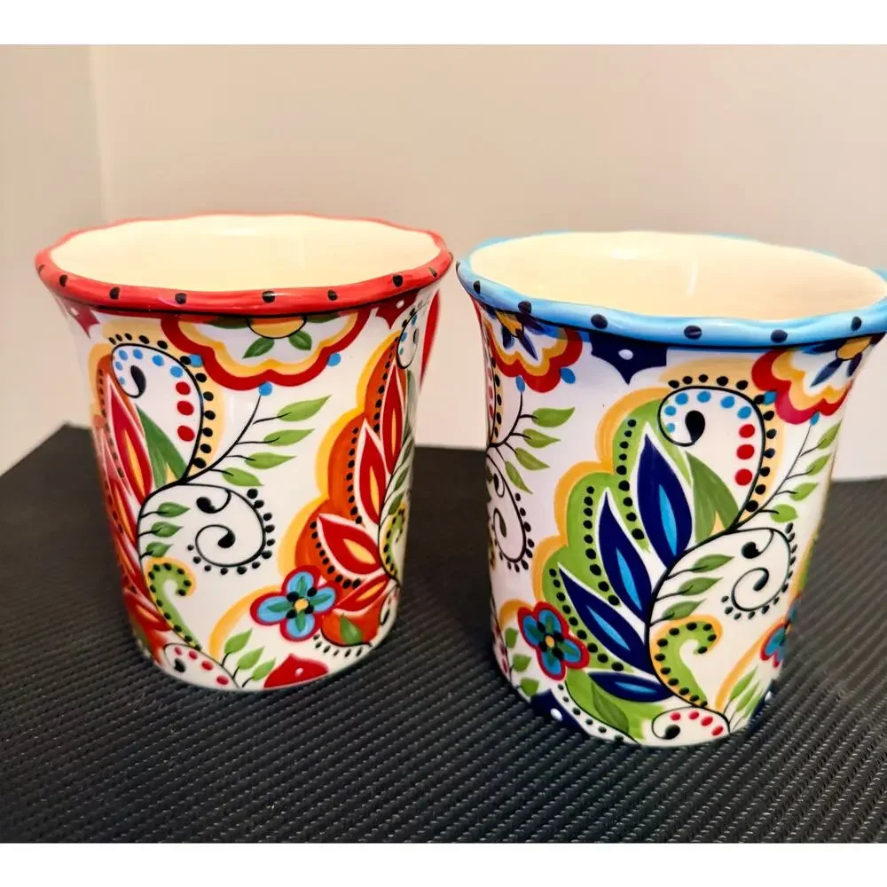 Two Tabletops Unlimited’s Bocca España handcrafted earthenware mugs.